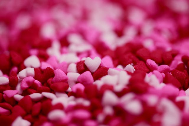 Pile of small puffy red, white, and pink hearts.