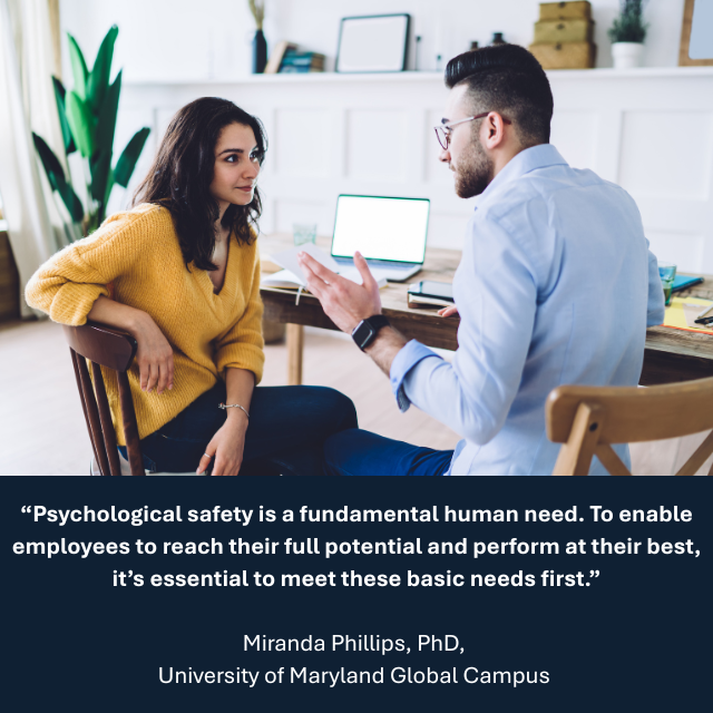 Two people talking at a desk with a laptop computer on it. Caption reads: “Psychological safety is a fundamental human need. To enable employees to reach their full potential and perform at their best, it’s essential to meet these basic needs first.” -Miranda Phillips, PhD, Department of Applied Sciences, University of Maryland Global Campus 