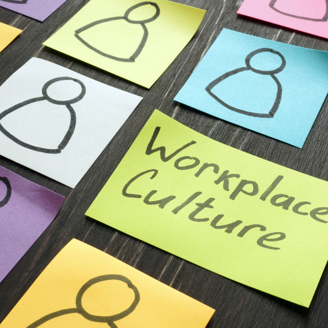 Several sticky notes of different colors with a person silhouette drawn on each, plus one that reads, “Workplace Culture.”