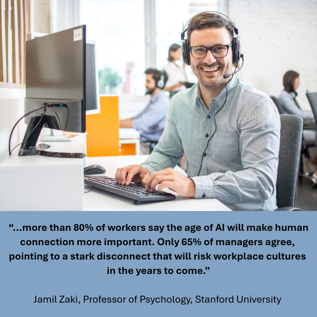 Smiling person working at computer. Caption reads: “...more than 80% of workers say the age of AI will make human connection more important. Only 65% of managers agree, pointing to a stark disconnect that will risk workplace cultures in the years to come.” -Jamil Zaki, Professor of Psychology, Stanford University 