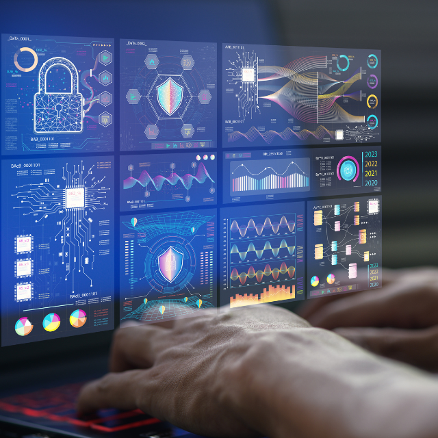 A person types on a laptop while a futuristic overlay of data dashboards and analytics fills the screen, including charts, graphs, and cybersecurity icons.